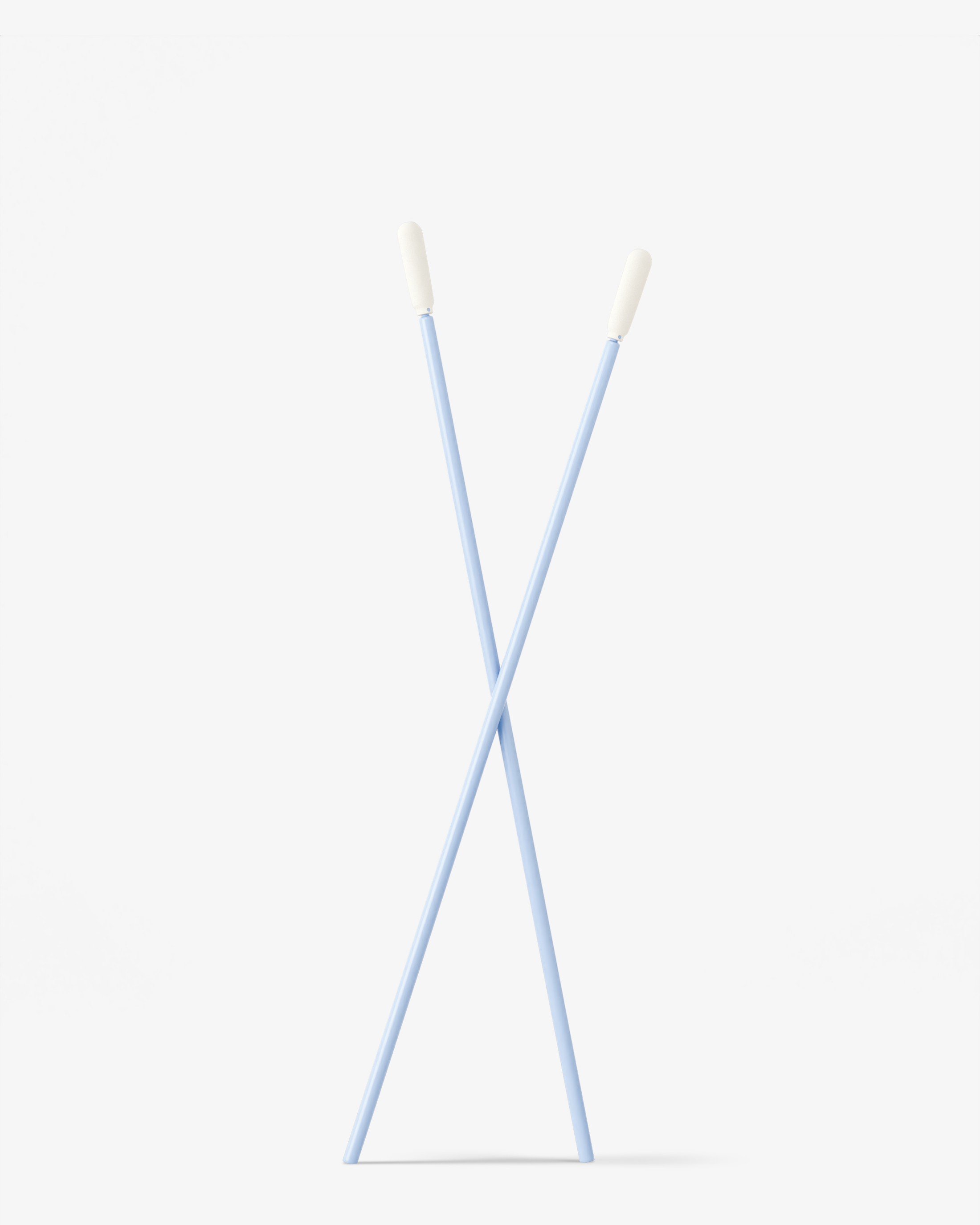 Two light blue petsmile Professional Toothpaste Applicator Swabs with white tips are crossed in an X shape on a plain white background, ideal for precise pet dental care.