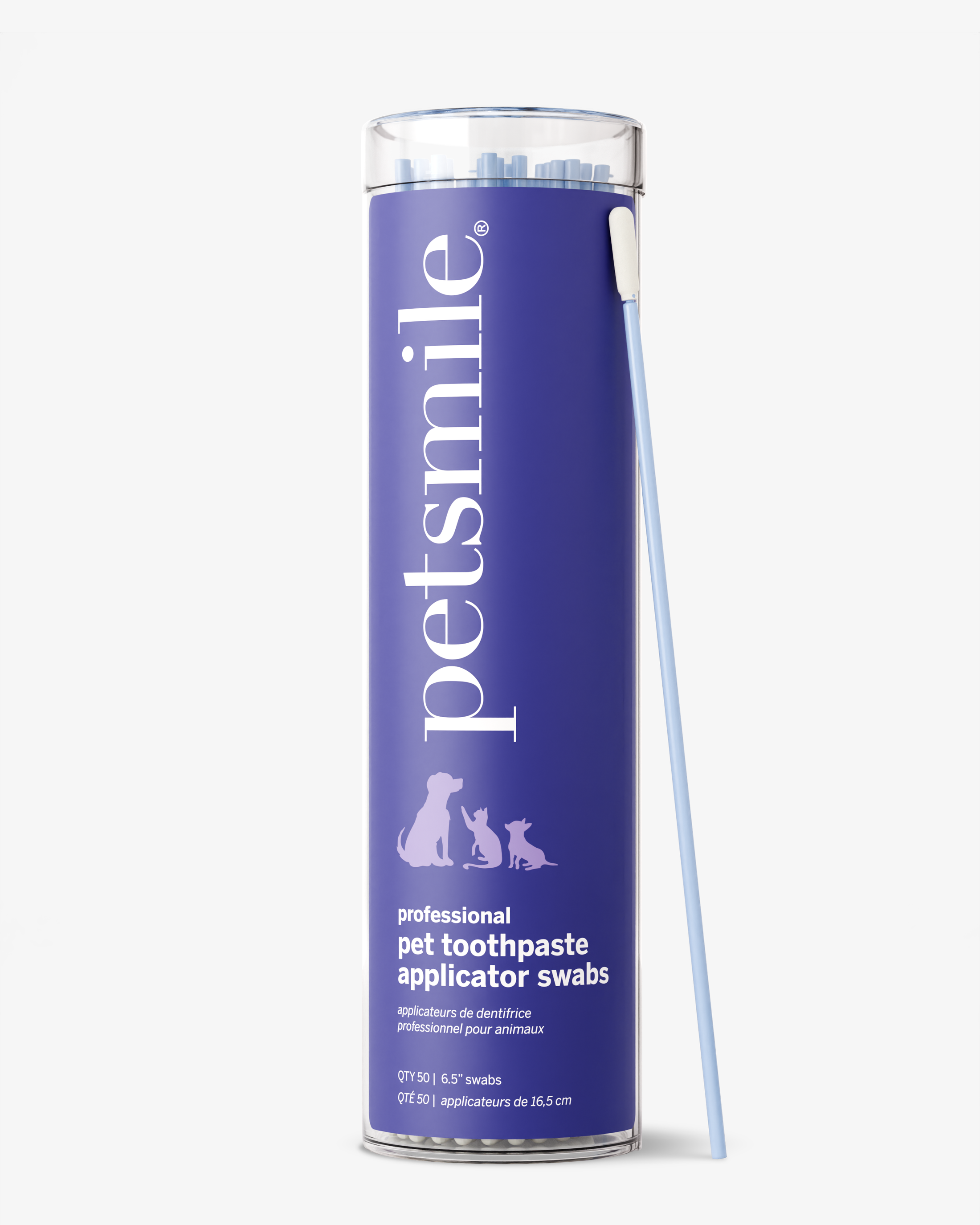 A cylindrical petsmile container labeled Professional Toothpaste Applicator Swabs holds dental care swabs for pets, with one long blue swab leaning against it. The label displays silhouettes of a dog and two cats on a purple background.