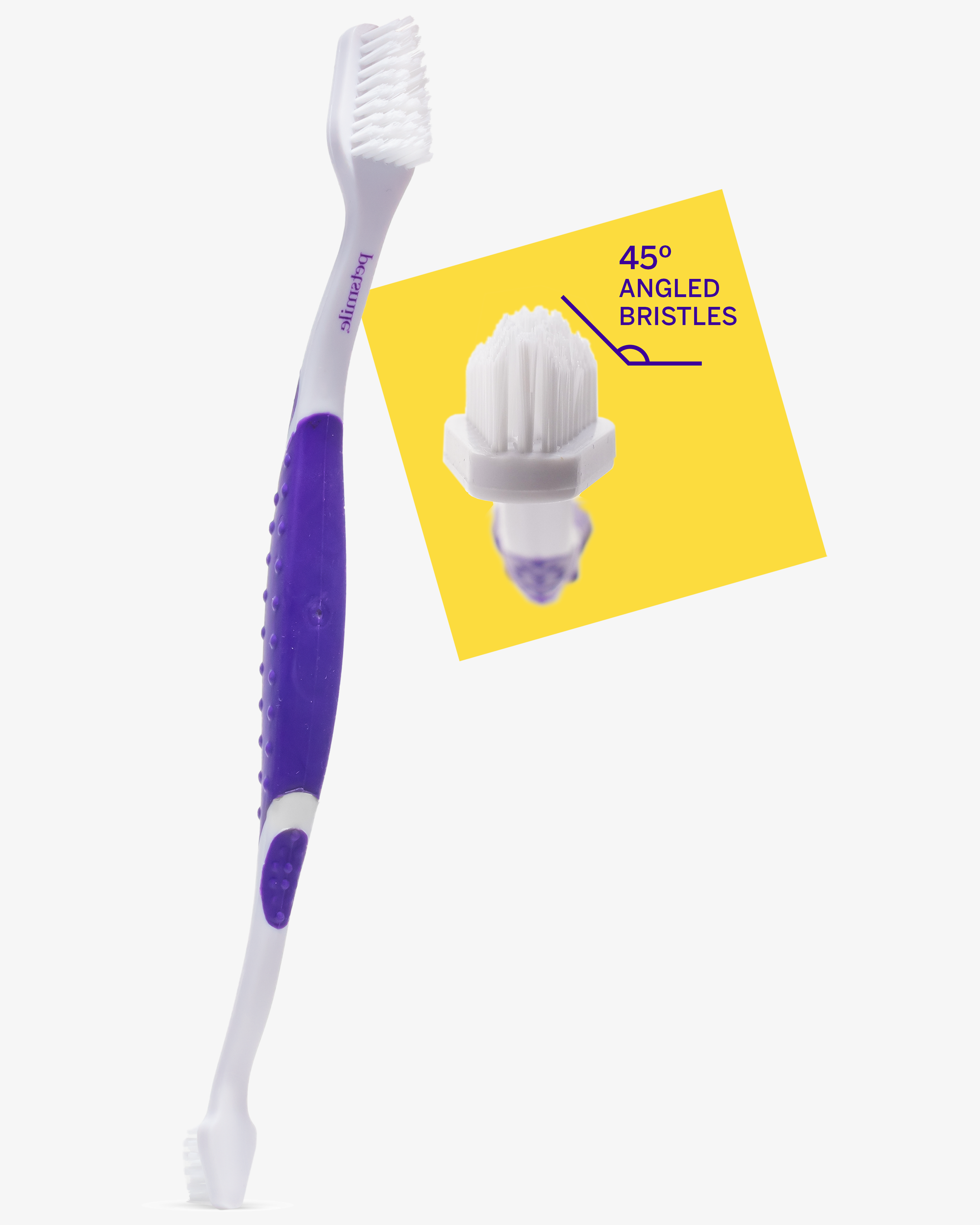 A white and purple petsmile Professional Pet Toothbrush with a patented 45° dual-ended brush head and DuPont® soft nylon bristles, shown on a yellow background with an inset highlighting the angled bristles for pet oral health.
