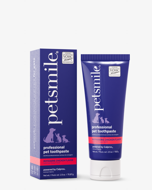 A box and tube of petsmile Professional Pet Toothpaste - Rotisserie Chicken Flavor - Small, with purple packaging featuring the petsmile logo and dog and cat silhouettes, formulated with Calprox for advanced oral health.