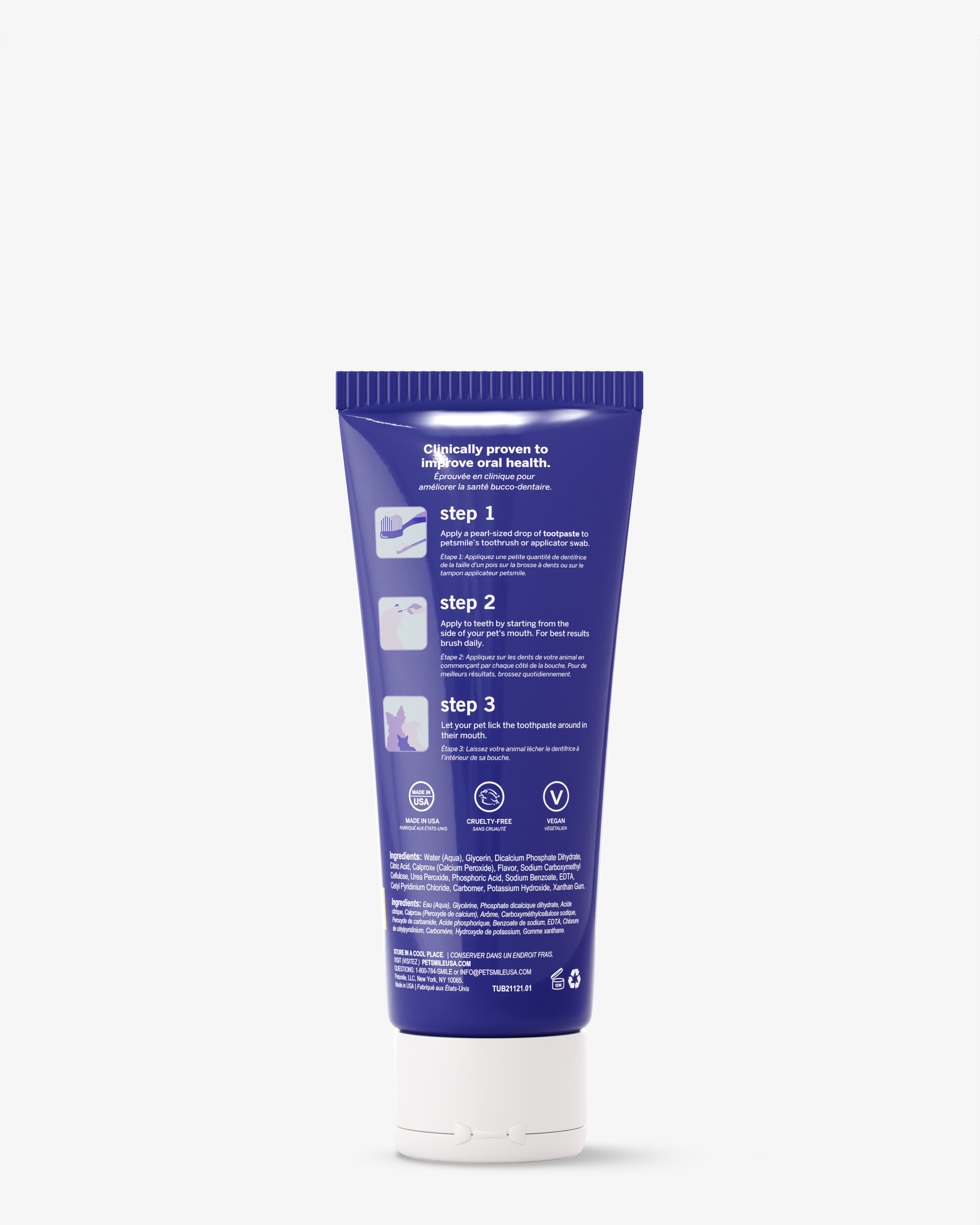 A blue petsmile Professional Toothpaste London Broil Small tube is shown from the back with white text, usage instructions, icons, and ingredient details featuring the Calprox formula near the bottom, alongside a Professional Pet Toothbrush.