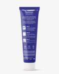 Load image into Gallery viewer, A blue tube of petsmile Professional Toothpaste London Broil Large stands upright. The back label lists three usage steps and notes its vegan, cruelty-free, made with natural ingredients, and uses the Calprox formula for dental care.
