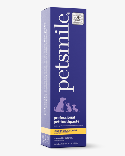 A tall, purple rectangular box of petsmile Professional Toothpaste London Broil (4.2 oz/119 g) and Professional Pet Toothbrush features dog and cat silhouettes, calprox formula, VOHC acceptance, and “London Broil Flavor” label.