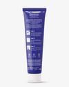 A blue tube of petsmile Professional Toothpaste Rotisserie Chicken Large with white text, clean and vegan icons, Calprox formula details, and a white cap next to the Professional Pet Toothbrush on a plain background—advanced pet dental care.
